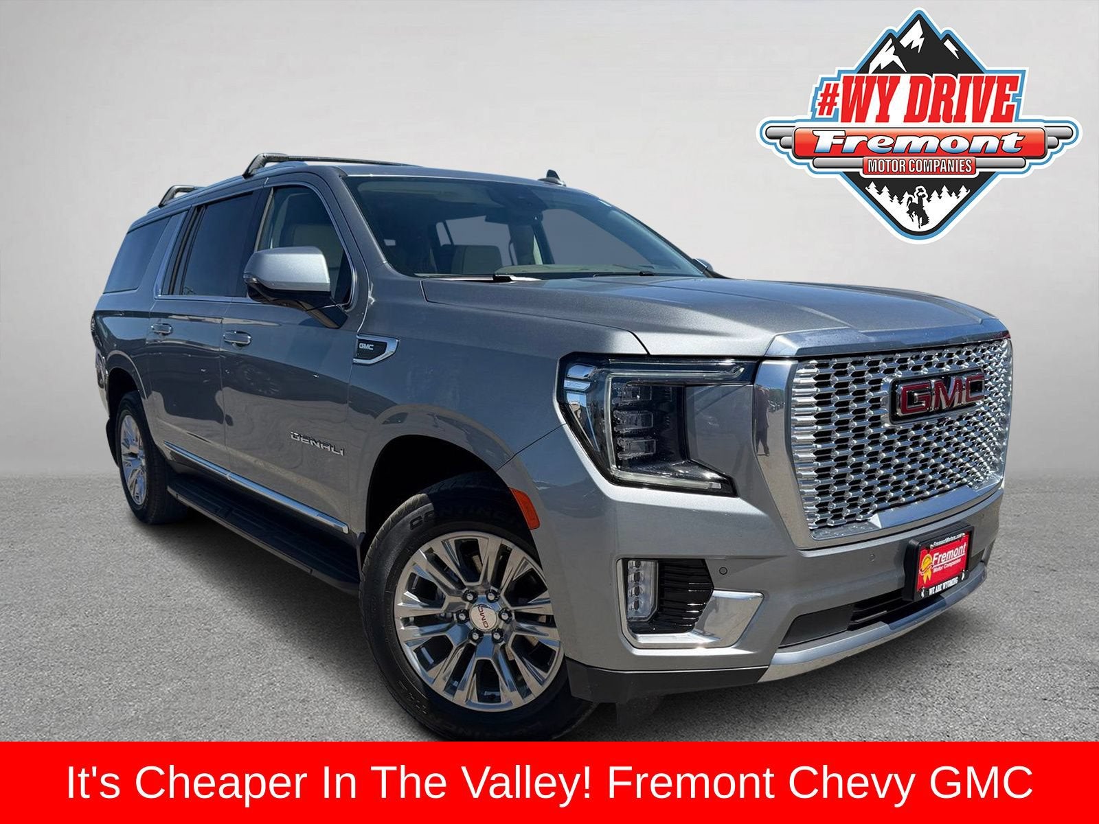 2023 GMC Yukon XL Denali in Sterling Metallic — front three-quarter view