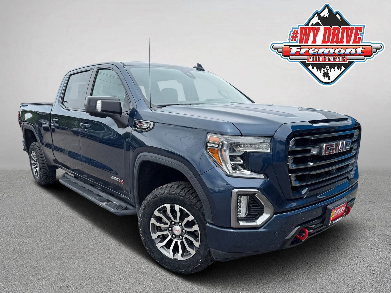 2020 GMC Sierra 1500 AT4 in Pacific Blue Metallic — front three-quarter view