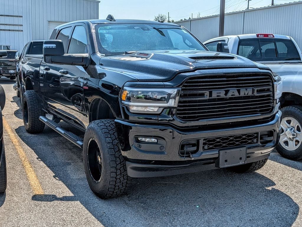 2024 RAM 3500 Laramie in Diamond Black Crystal Pearlcoat — front three-quarter view