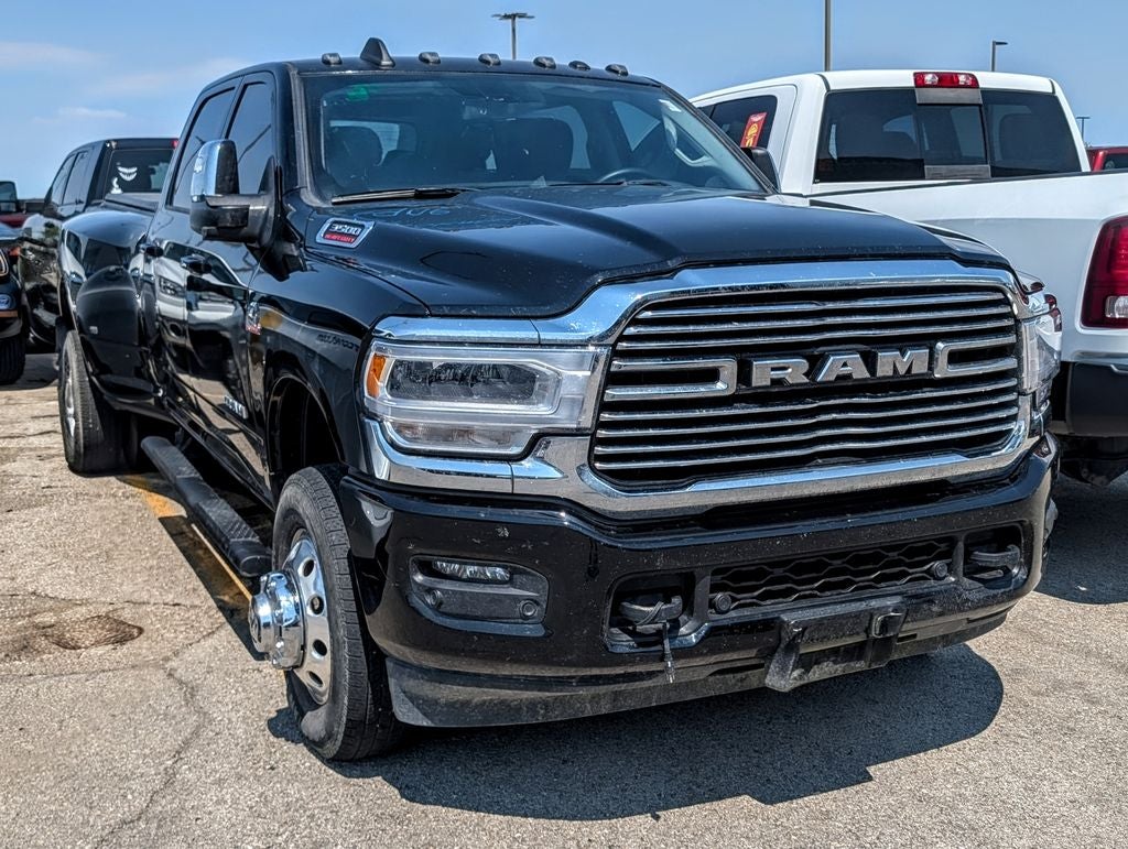 2024 RAM 3500 Laramie in Diamond Black Crystal Pearlcoat — front three-quarter view