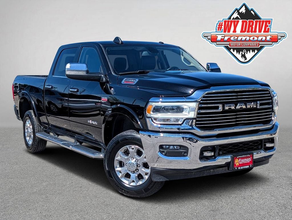 2022 RAM 2500 Laramie in Diamond Black Crystal Pearlcoat — front three-quarter view