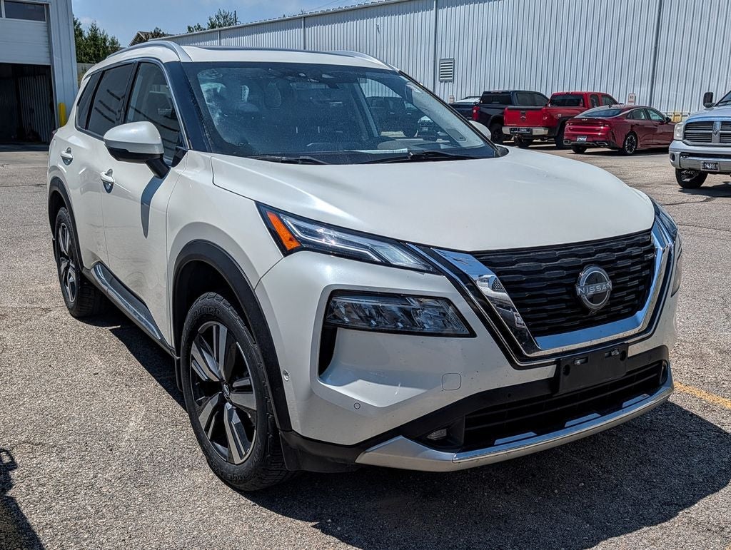 2022 Nissan Rogue Platinum AWD in Pearl White Tricoat — front three-quarter view