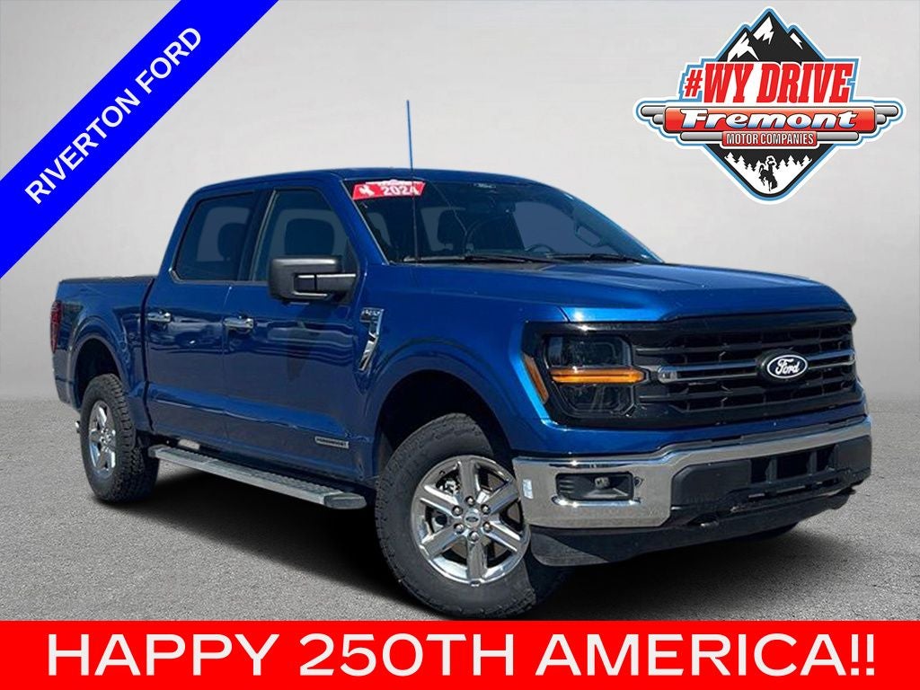 2024 Ford F-150 XLT in Atlas Blue Metallic — front three-quarter view