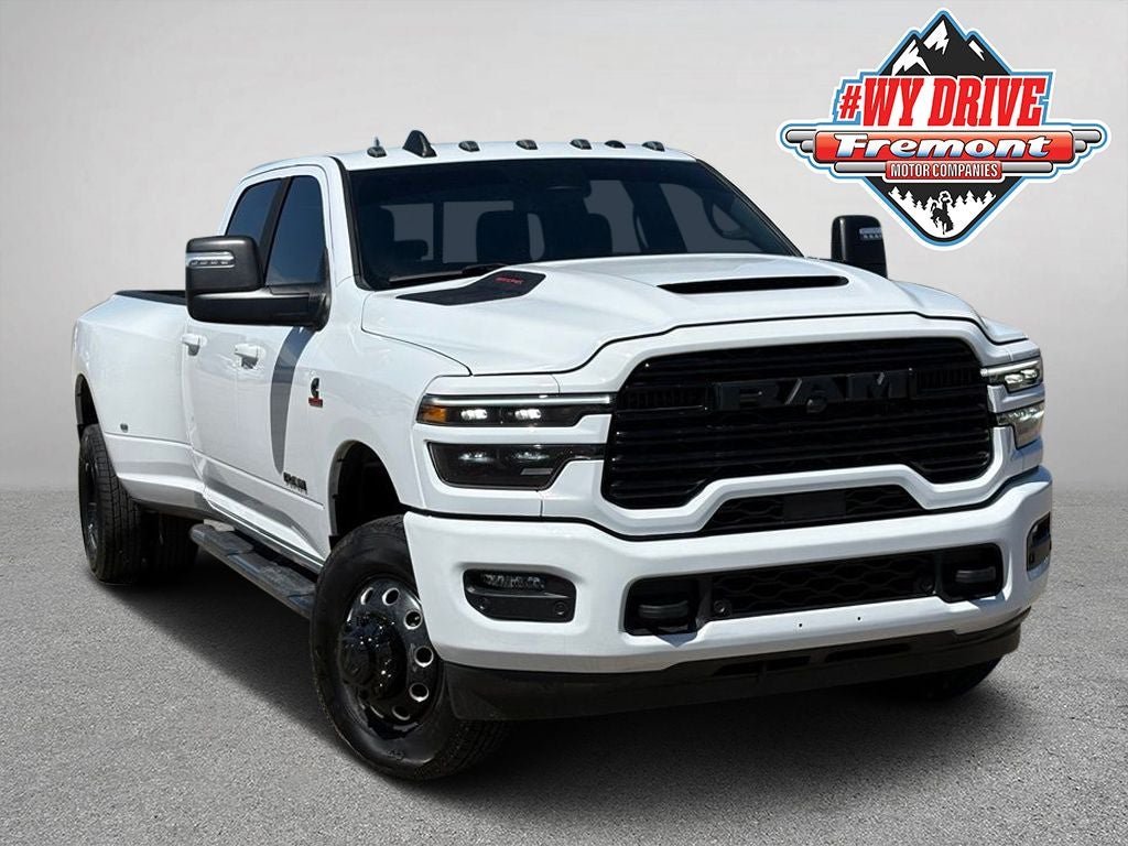 2025 RAM 3500 Laramie in Bright White Clearcoat — front three-quarter view