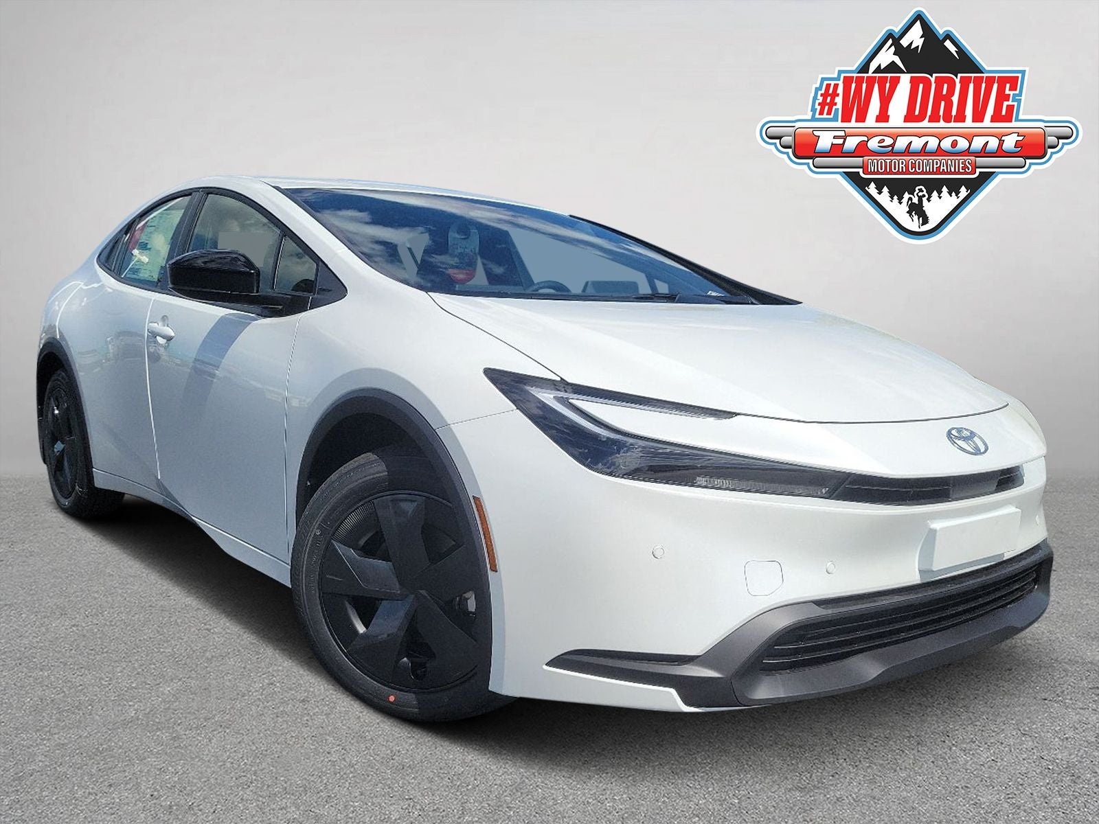 2026 Toyota Prius LE in White — front three-quarter view