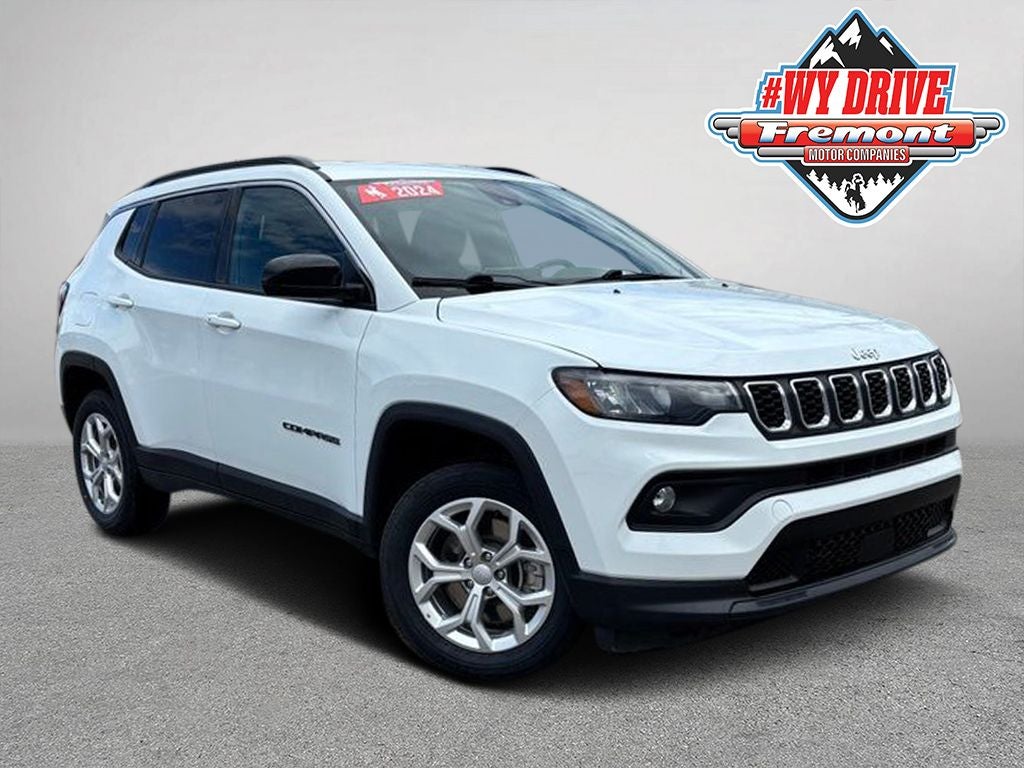 2024 Jeep Compass Latitude in Bright White Clearcoat — front three-quarter view