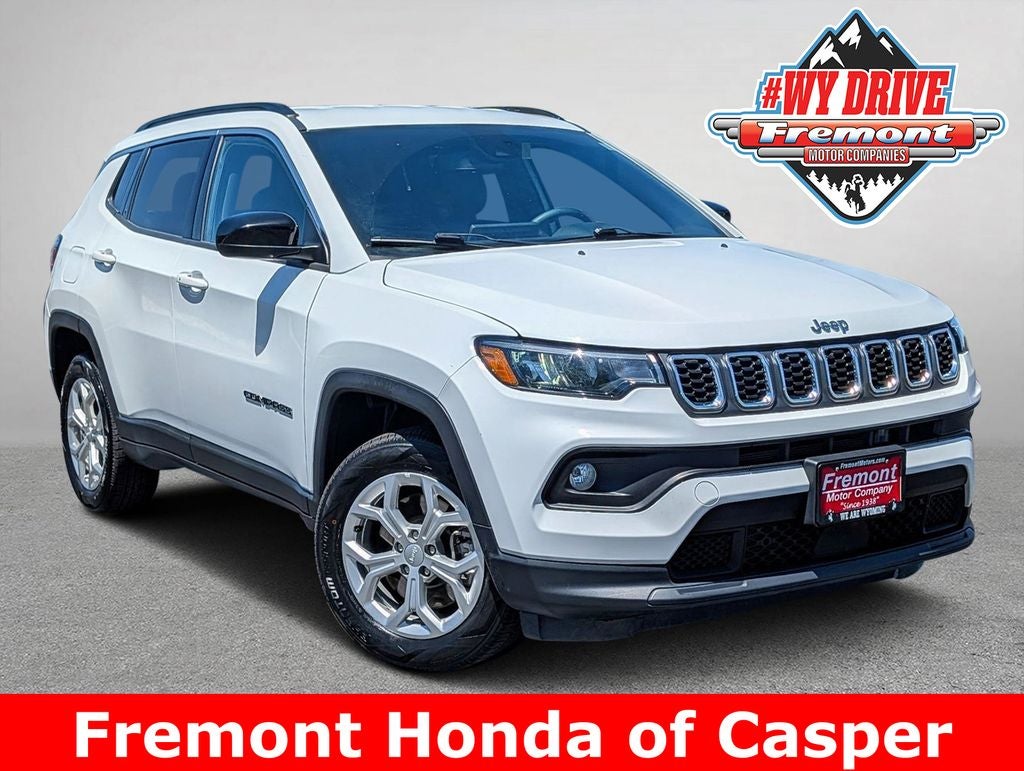 2024 Jeep Compass Latitude in Bright White Clearcoat — front three-quarter view
