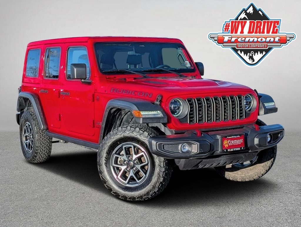 2025 Jeep Wrangler Rubicon in Firecracker Red Clearcoat — front three-quarter view