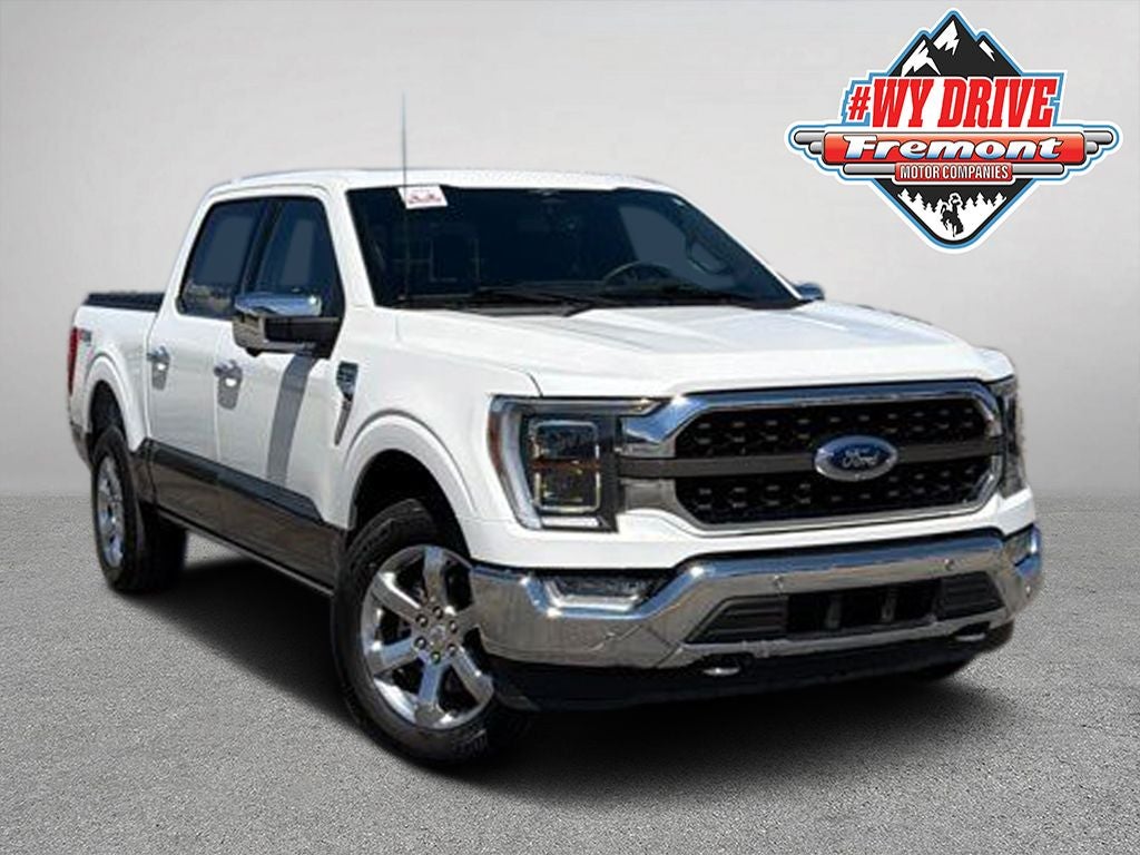 2023 Ford F-150 King Ranch in Star White Metallic Tri-Coat — front three-quarter view