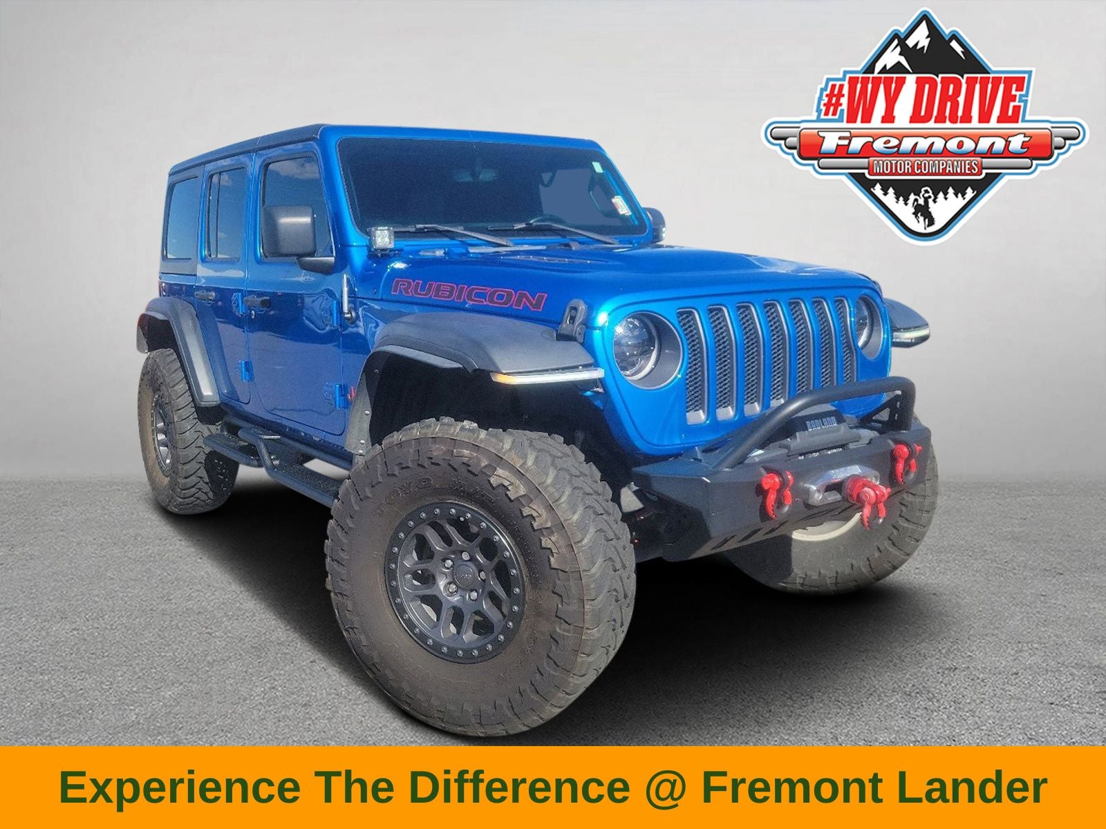 2022 Jeep Wrangler Unlimited Rubicon in Hydro Blue Pearl Coat — front three-quarter view
