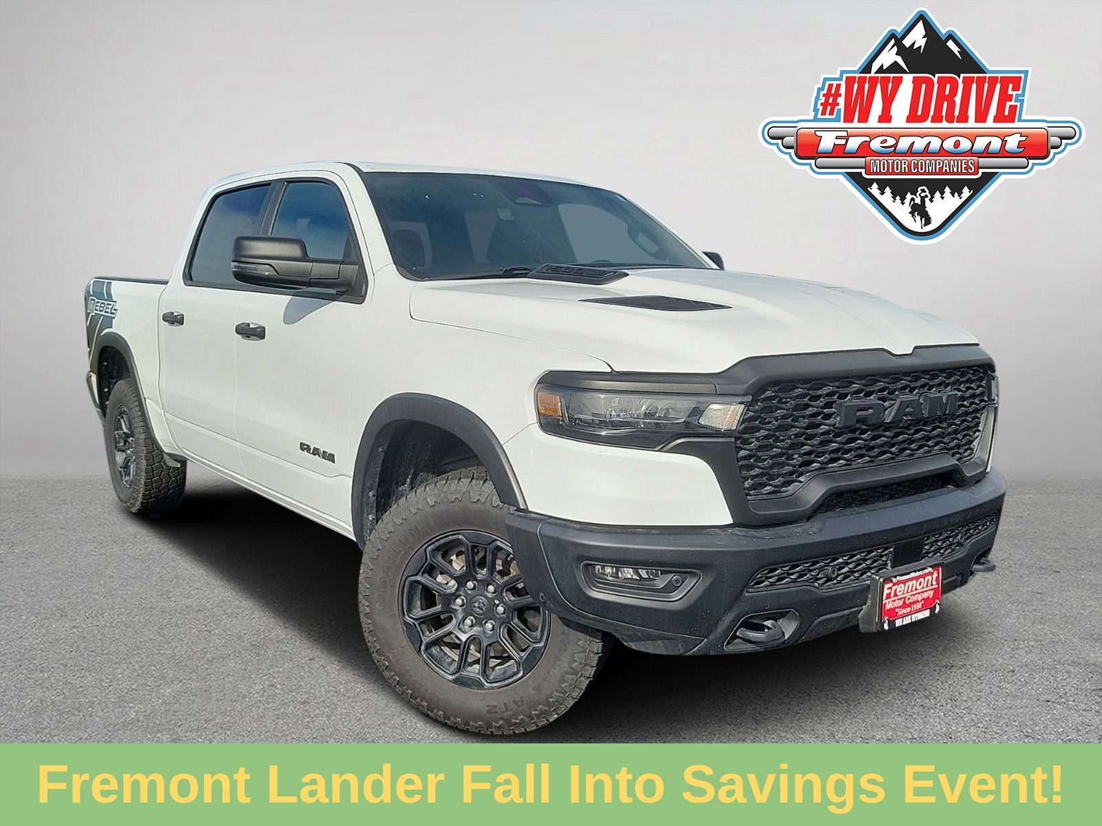 2025 RAM 1500 Rebel in Bright White Clearcoat — front three-quarter view