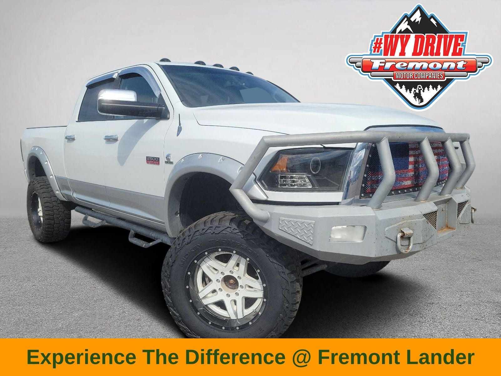 2012 RAM 2500 Laramie in Bright White Clearcoat — front three-quarter view